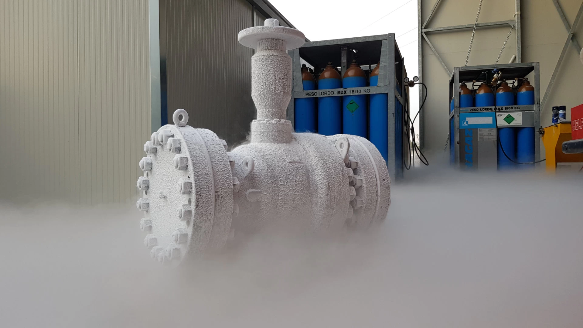 Industrial cryogenic valve during low-temperature testing for the upgrade of a regasification system on an FSRU vessel