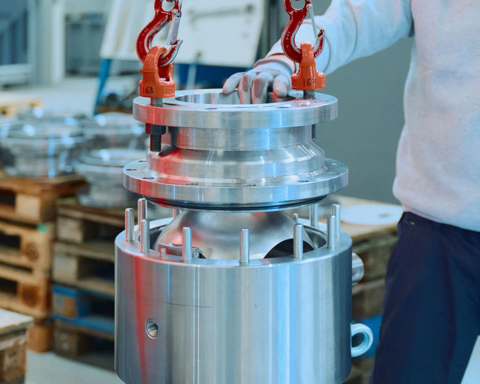 Assembly of an industrial ball valve during the manufacturing process in the workshop